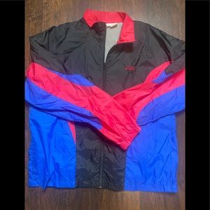 Windbreaker blue and pink, perfect for the spring. Oversize/size L.